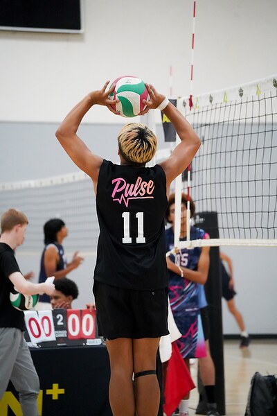 Josh setting the ball with both hands overhead